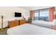 Comfortable main room with two beds, ocean view access, and furniture at 201 74Th Ave. N # 2941, Myrtle Beach, SC 29572