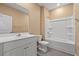 Clean bathroom featuring a white vanity, toilet, and tub/shower with a white surround at 2015 Borgata Loop, Longs, SC 29568