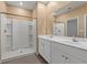 Bathroom featuring dual sinks, a walk-in shower, and modern fixtures for a spa-like experience at 2015 Borgata Loop, Longs, SC 29568