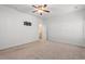 Spacious bedroom with neutral carpet and a ceiling fan, ready for personalization and relaxation at 2015 Borgata Loop, Longs, SC 29568