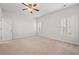 Bright bedroom with neutral carpet, ceiling fan, and plantation shutters for a serene retreat at 2015 Borgata Loop, Longs, SC 29568