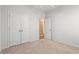 A cozy bedroom with carpet and a closet featuring a set of double doors at 2015 Borgata Loop, Longs, SC 29568
