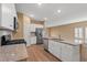 Modern kitchen with granite countertops, stainless steel appliances, and an open floor plan at 2015 Borgata Loop, Longs, SC 29568