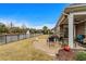 Serene backyard view with a beautiful pond and patio area, perfect for outdoor relaxation at 205 Deep Blue Dr., Myrtle Beach, SC 29579