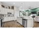 Bright and modern kitchen featuring stainless steel appliances and an island with seating at 205 Deep Blue Dr., Myrtle Beach, SC 29579
