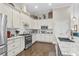 Updated kitchen with an island, granite countertops, stainless steel appliances, and hardwood floors at 205 Deep Blue Dr., Myrtle Beach, SC 29579