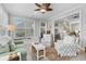 Inviting living room with comfortable seating, a window seat, and an open doorway to the kitchen at 205 Deep Blue Dr., Myrtle Beach, SC 29579