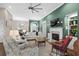 Bright living room featuring a fireplace, built-in shelving, and comfortable seating area at 205 Deep Blue Dr., Myrtle Beach, SC 29579