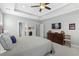 Relaxing main bedroom features a tray ceiling and neutral color scheme at 205 Deep Blue Dr., Myrtle Beach, SC 29579