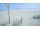Scenic beach view with a 25th Avenue South sign, showcasing the sandy shores and clear skies at 210 25Th Ave. S # 26, Myrtle Beach, SC 29577
