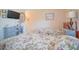 Charming bedroom with twin beds, floral comforters, and a dresser at 210 25Th Ave. S # 26, Myrtle Beach, SC 29577