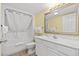 Clean bathroom featuring a shower/tub combo, a toilet, and a vanity with ample storage at 2201 S Ocean Blvd. # 1806, Myrtle Beach, SC 29577