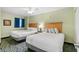 Inviting bedroom with two queen beds, soft lighting, and colorful decor at 2201 S Ocean Blvd. # 1806, Myrtle Beach, SC 29577