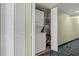 Convenient laundry closet featuring a stacked washer and dryer unit at 2201 S Ocean Blvd. # 1806, Myrtle Beach, SC 29577