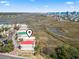 Aerial view of the homes showing proximity to waterway, beach, and local neighborhood amenities at 2304 Pointe Marsh Ln., North Myrtle Beach, SC 29582