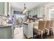 Charming kitchen with pendant lighting, island seating, and decorative elements at 2304 Pointe Marsh Ln., North Myrtle Beach, SC 29582