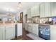 Bright kitchen with a tiled backsplash, modern appliances, and plenty of countertop space at 2304 Pointe Marsh Ln., North Myrtle Beach, SC 29582