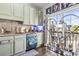 Unique kitchen design featuring decorative lighting, modern appliances, and a decorative backsplash at 2304 Pointe Marsh Ln., North Myrtle Beach, SC 29582