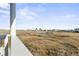 Expansive marsh view, with a glimpse of the city skyline in the distance, from the home's balcony at 2304 Pointe Marsh Ln., North Myrtle Beach, SC 29582