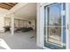 View of the outdoor patio from indoors, featuring comfortable seating and a relaxing outdoor space at 2304 Pointe Marsh Ln., North Myrtle Beach, SC 29582