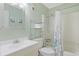 Cozy bathroom features a shower-tub combo, vanity with sink, and mirrored cabinet at 2405 S Ocean Blvd. # 105, North Myrtle Beach, SC 29582