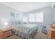 Serene bedroom with a comfortable bed, soft lighting, and tranquil decor for a peaceful night's sleep at 2405 S Ocean Blvd. # 105, North Myrtle Beach, SC 29582