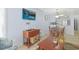 Open living space with dining area and adjacent kitchen featuring stainless steel appliances at 2405 S Ocean Blvd. # 105, North Myrtle Beach, SC 29582