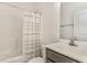 A cozy bathroom featuring a shower-tub combo with a sink and vanity to the right at 245 Maiden'S Choice Dr., Conway, SC 29527