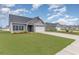 Charming home with manicured lawn and landscaping, enhancing curb appeal at 245 Maiden'S Choice Dr., Conway, SC 29527