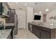 Contemporary kitchen with granite countertops, stainless steel appliances, and a view of the living area at 245 Maiden'S Choice Dr., Conway, SC 29527
