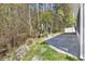 Home's backyard featuring natural landscaping, and patio at 248 Upper Saddle Circle, Conway, SC 29526