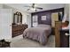 Bedroom with carpet, lavender accent wall, and full furniture set at 248 Upper Saddle Circle, Conway, SC 29526