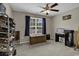 Bedroom with a ceiling fan, a large window, and a storage chest at 248 Upper Saddle Circle, Conway, SC 29526