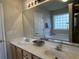 Bathroom with double sink vanity and countertop, plus a soaking tub with glass block window at 280 Barclay Dr., Myrtle Beach, SC 29579