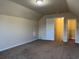 Bedroom featuring neutral carpet, walk-in closet, and attic-style ceiling, great for personalization at 280 Barclay Dr., Myrtle Beach, SC 29579