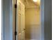 Walk-in closet with wire shelving and white door, providing efficient storage space at 280 Barclay Dr., Myrtle Beach, SC 29579