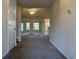 Spacious living room with neutral carpeting, ceiling fan, and good natural light at 280 Barclay Dr., Myrtle Beach, SC 29579