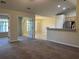 View of living room with archway to kitchen, and French doors to sunroom at 280 Barclay Dr., Myrtle Beach, SC 29579