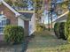 A view of the side yard with grass and trees at 280 Barclay Dr., Myrtle Beach, SC 29579