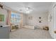 This bright bedroom features a fan and toddler bed at 288 Rum Gully Rd., Murrells Inlet, SC 29576