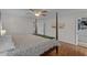 Spacious main bedroom with a four-poster bed, walk-in closet, and plenty of natural light at 288 Rum Gully Rd., Murrells Inlet, SC 29576