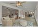 Inviting sun room with comfortable seating, stylish decor, and seamless transition to the living spaces at 288 Rum Gully Rd., Murrells Inlet, SC 29576