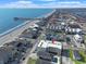 The building is near the beach and pier, offering scenic views and convenient access to waterfront activities at 301 N Waccamaw Dr. # 209, Garden City Beach, SC 29576