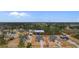Aerial view of a property, showing its location and surrounding neighborhood in a wooded area at 3329 Hughes Gasque Rd., Aynor, SC 29511