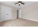 Bedroom with carpet, closet, and fan offering ample space and storage at 3329 Hughes Gasque Rd., Aynor, SC 29511
