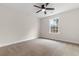 Neutral bedroom with carpet, window, and ceiling fan offers a calming retreat at 3329 Hughes Gasque Rd., Aynor, SC 29511