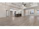 Open-concept living area connecting the kitchen, dining, and Gathering spaces with coffered ceilings at 3329 Hughes Gasque Rd., Aynor, SC 29511