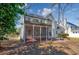Backyard featuring a screened porch and deck, perfect for relaxation and entertaining at 3604 Brampton Dr., Myrtle Beach, SC 29588