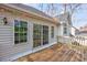 Back deck with windows and sliding door to enter the home at 3604 Brampton Dr., Myrtle Beach, SC 29588