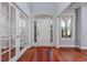 Welcoming foyer with gleaming hardwood floors and a view of the front door at 3604 Brampton Dr., Myrtle Beach, SC 29588